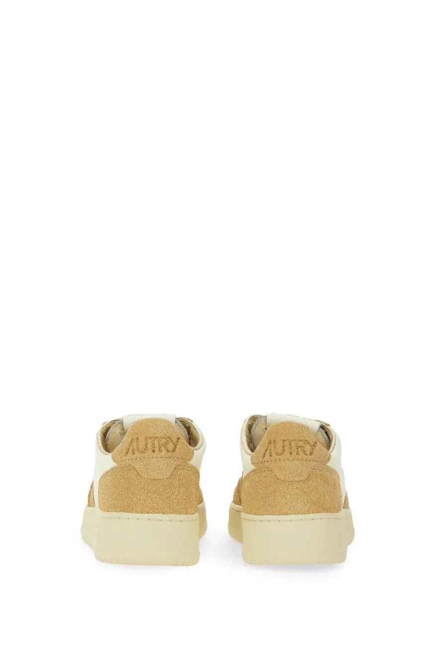 Autry women’s medalist low sneaker in cream suede and white leather with chunky rubber sole for casual wear