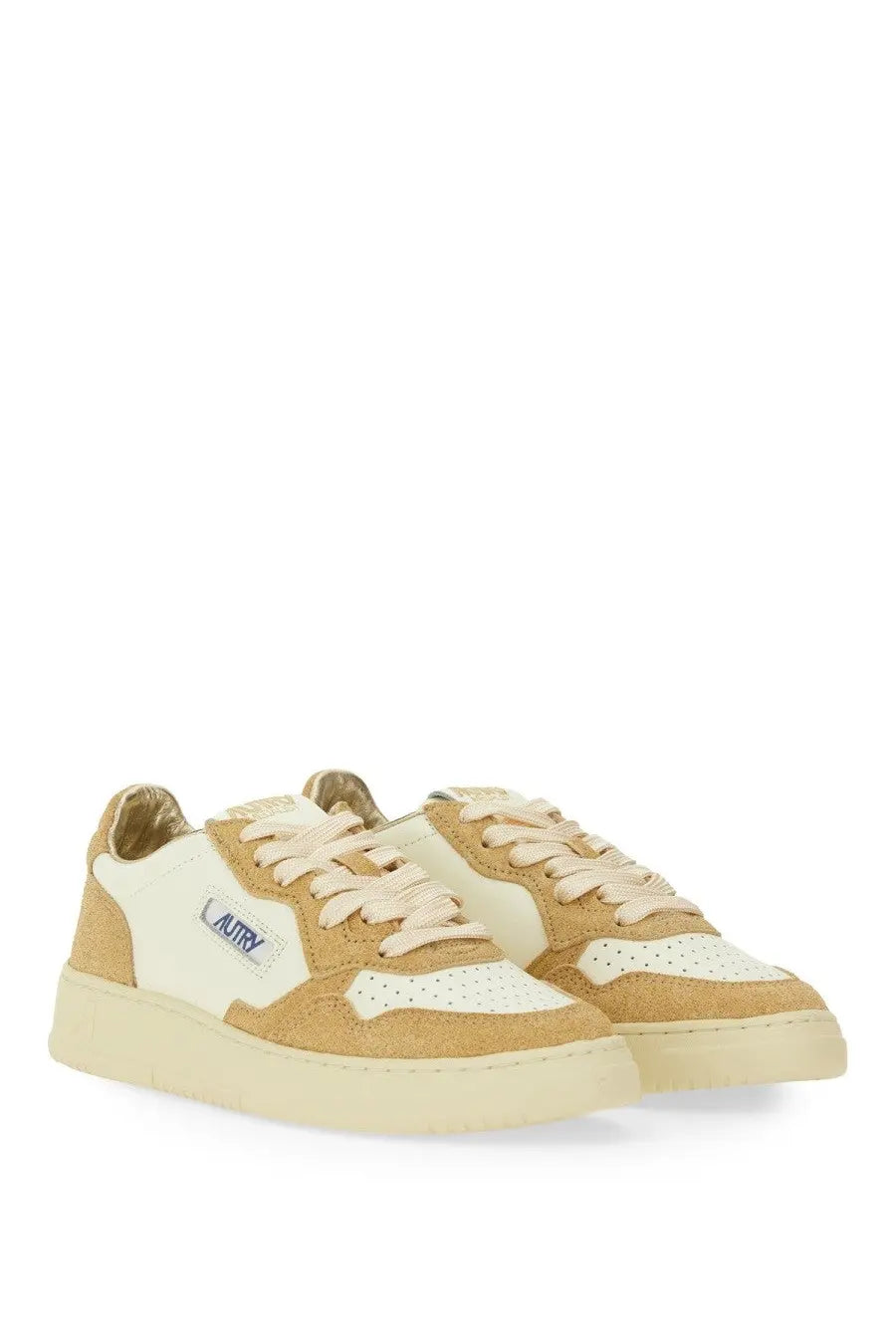 Autry women’s Medalist low sneaker in tan and cream suede with perforated detailing and white rubber sole
