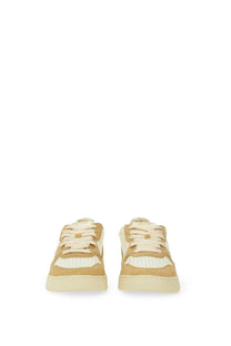Autry women’s Medalist low sneaker yellow with tan and cream leather, perforated white panels, and chunky rubber sole