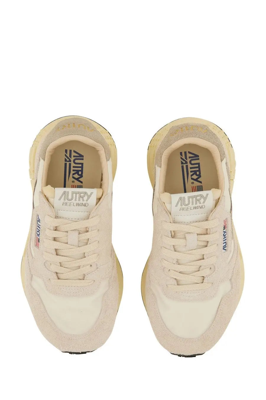 Autry women’s reelwind low sneaker in cream suede and canvas with chunky sole and branding on insole and side