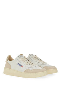 Autry women’s sneaker medalist low with cream suede leather, white perforated toe box, beige laces, and off-white sole