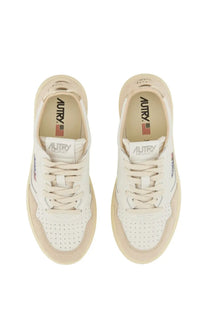Cream-colored suede and leather autry women’s sneaker medalist low with perforated toe box and white laces