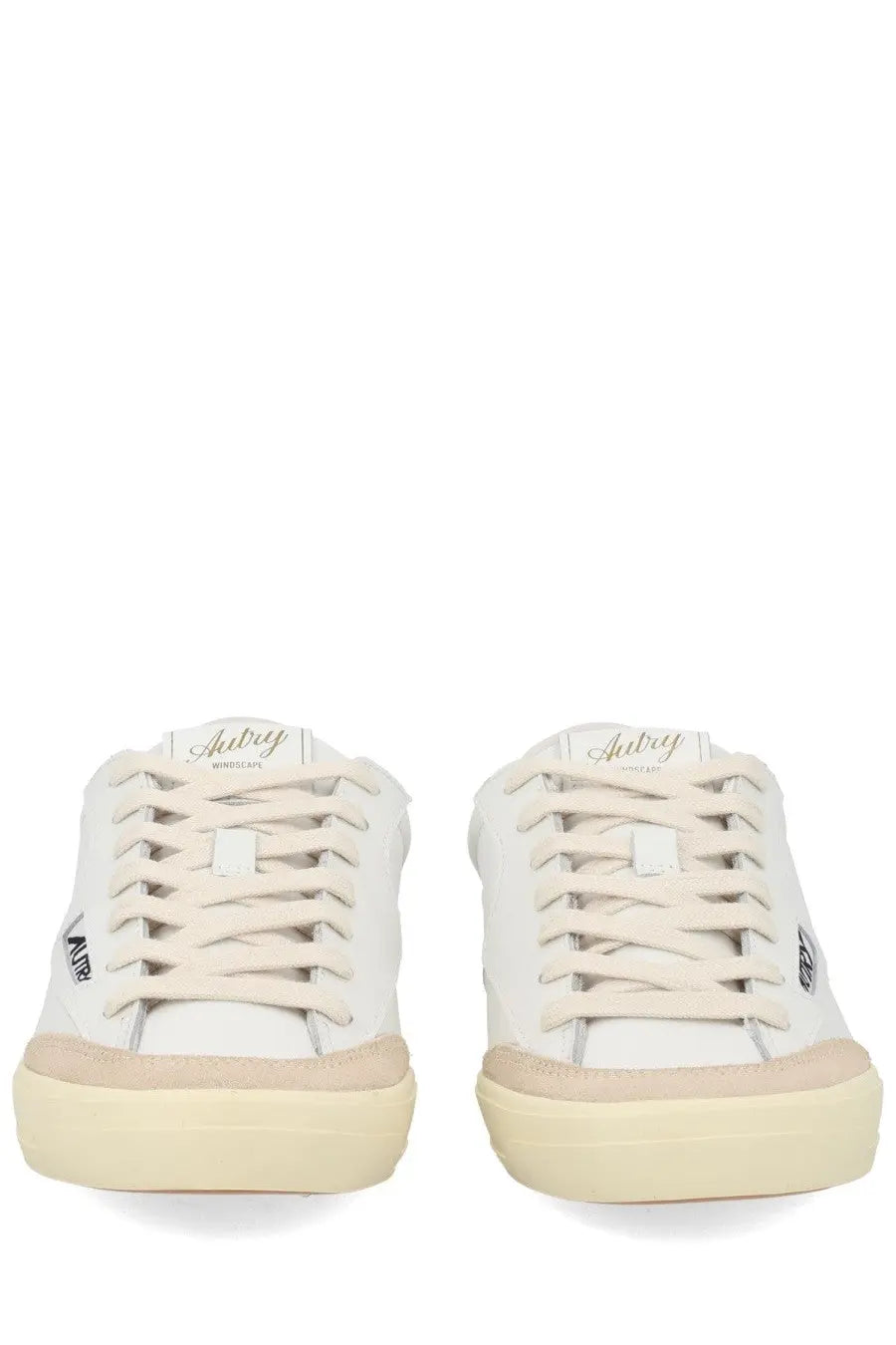 Autry women’s sneaker windscape low white with white canvas upper beige rubber soles and laces featuring subtle branding