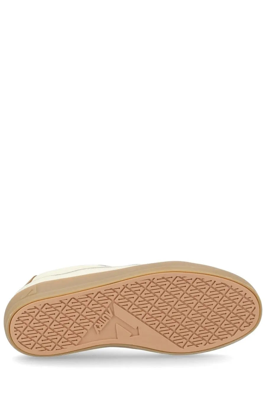 Beige rubber sole with geometric tread pattern and embossed logo on autry women’s sneaker windscape low white