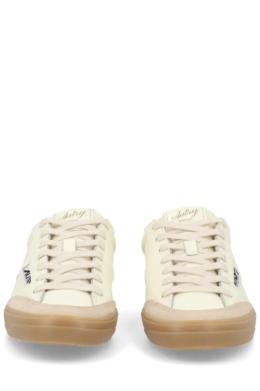 Autry women’s sneaker windscape low white cream-colored suede upper with gum rubber sole and subtle branding on tongue and side