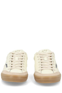 Autry women’s sneaker windscape low white cream-colored suede upper with gum rubber sole and subtle branding on tongue and side