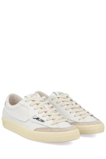 Autry women’s sneaker windscape low white leather with beige suede accents and cream rubber sole featuring mutry logo