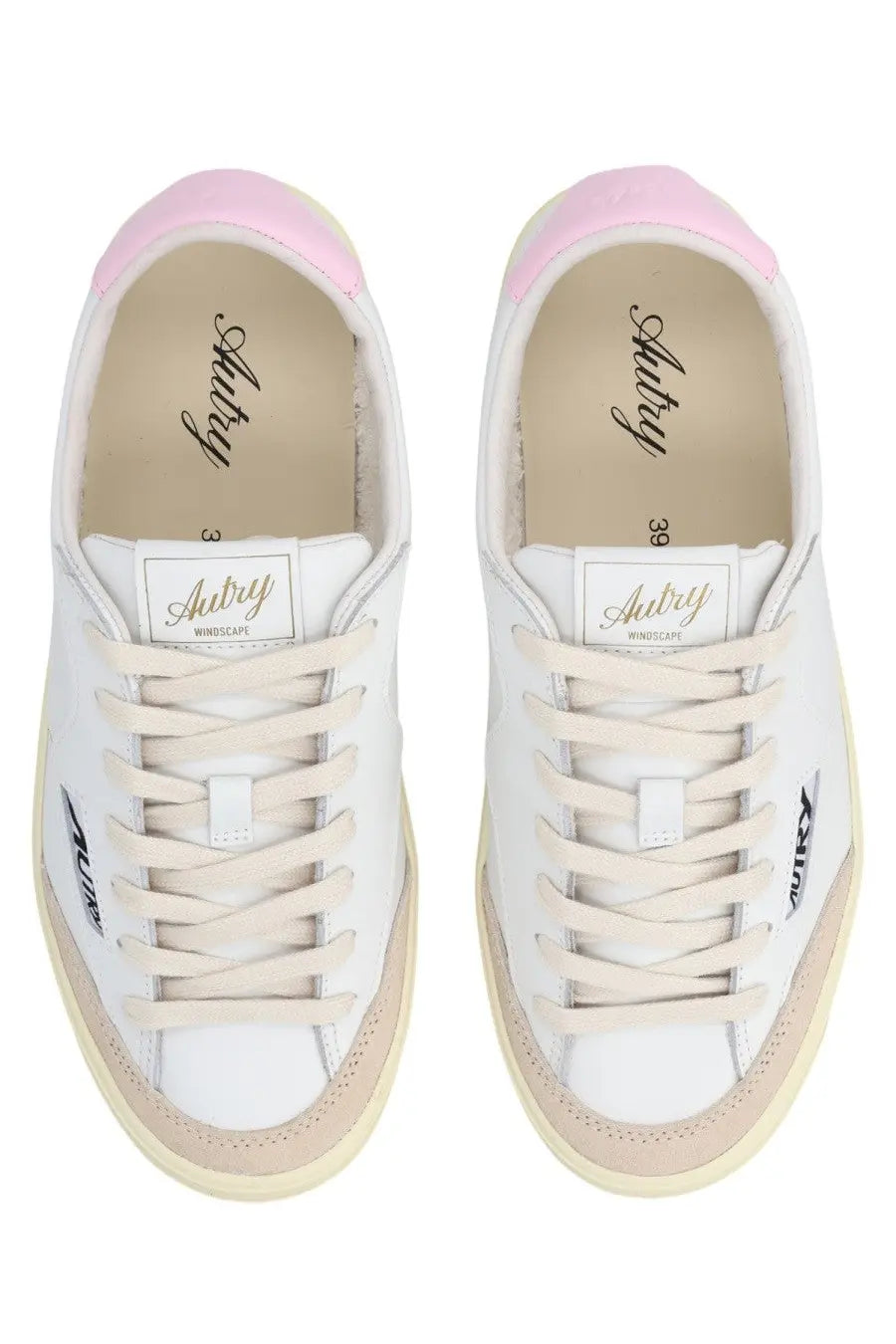 Autry women’s sneaker windscape low white leather with pink rubber toe caps beige accents and aubry branding