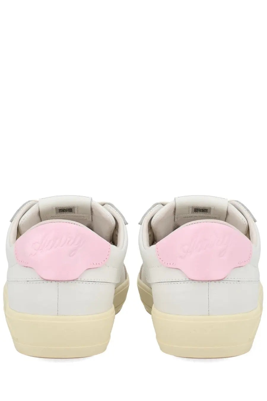Autry women’s sneaker windscape low white with white leather, soft pink suede heel tab, and cream rubber soles showing back side
