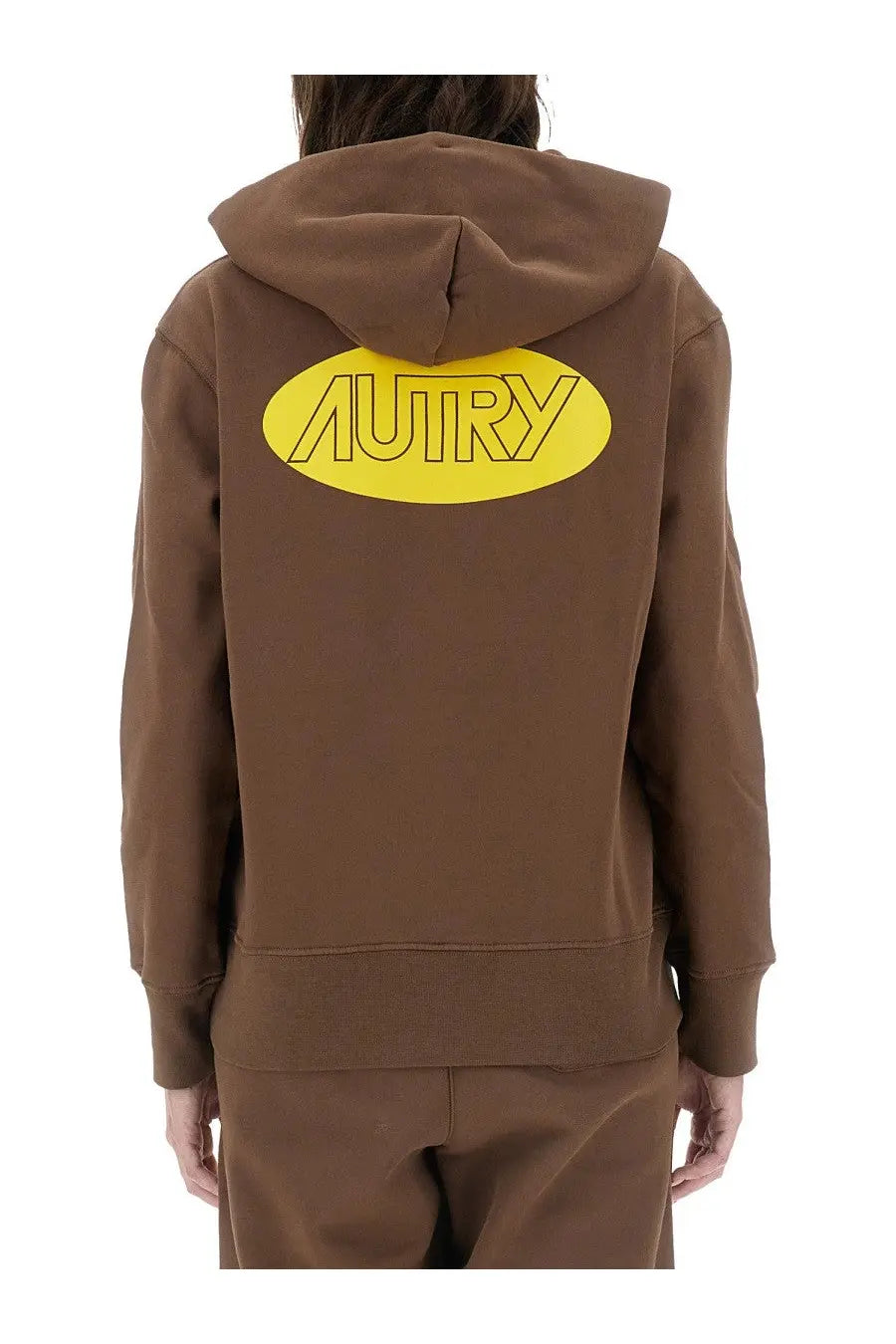 Back side of autry women’s brown hooded sweatshirt with bold yellow oval logo and black outlined autry letters