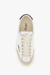 Autry women’s windscape leather sneakers with white leather, beige laces, black toe cap, and tan suede accents