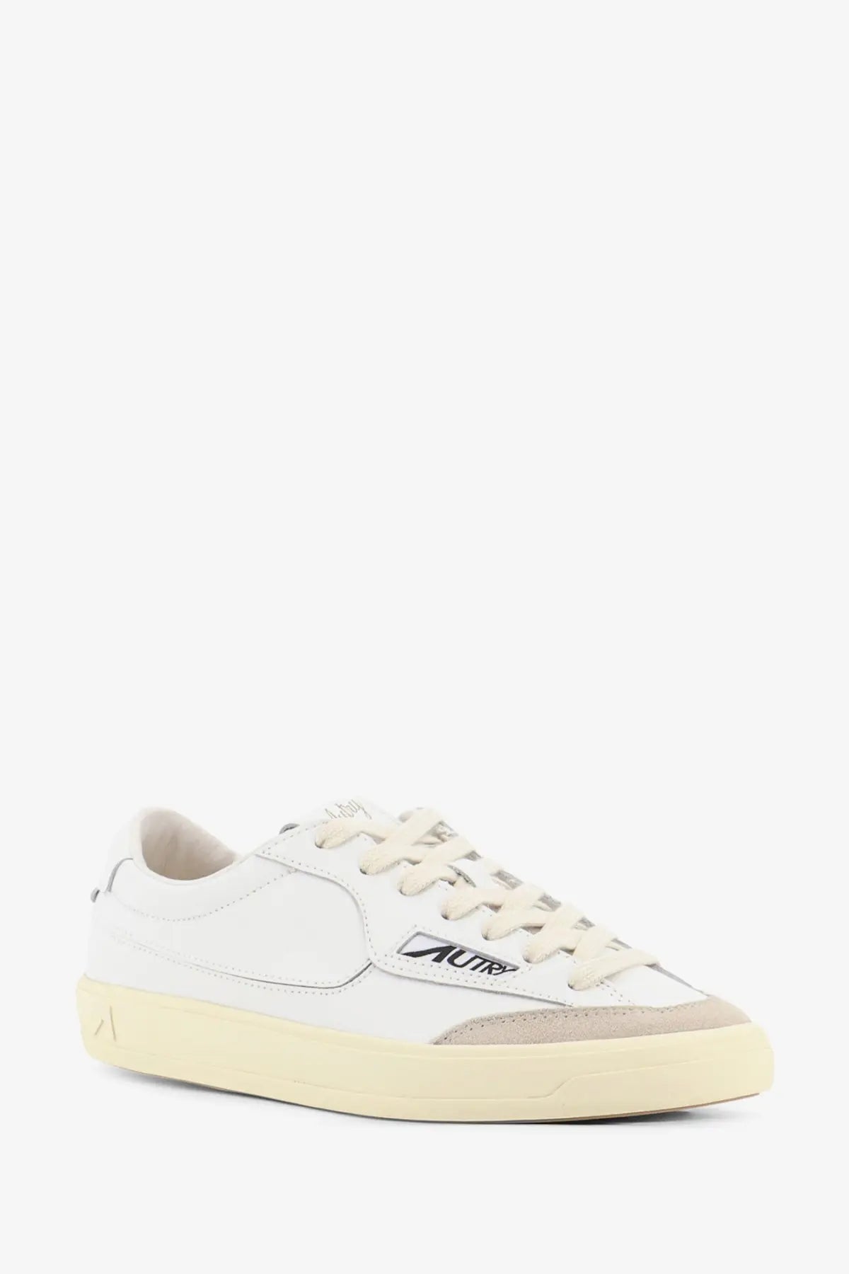 Autry women’s windscape leather sneakers in white with beige suede low-top design and subtle side logo