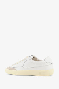Autry women’s windscape leather sneaker in white with beige rubber toe cap and sole featuring a minimalist design