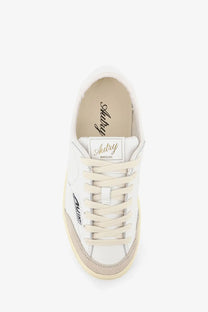 Autry women’s windscape leather sneakers white feature white leather low-top with beige sole and subtle branding accents