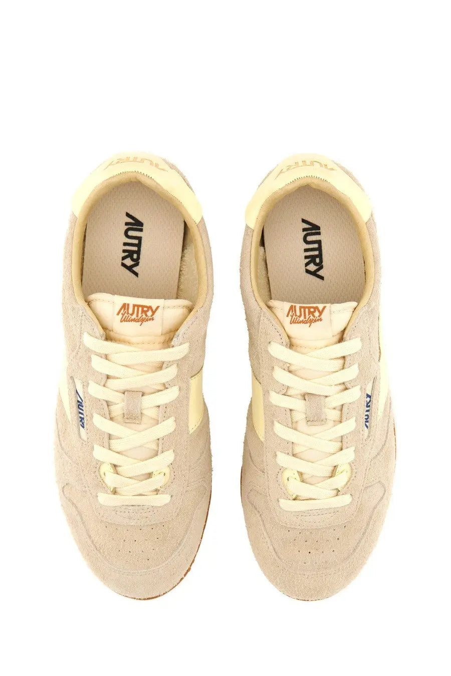 Autry women’s windspin low sneaker grey in beige suede with cream laces and subtle branding details