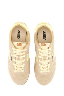 Autry women’s windspin low sneaker grey in beige suede with cream laces and subtle branding details