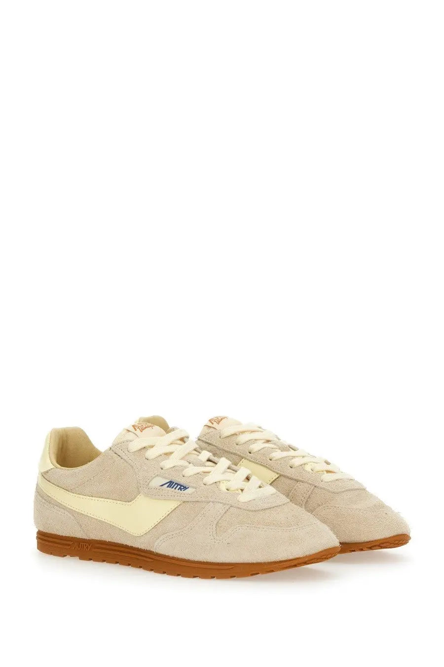 Autry women’s windspin low sneaker grey in beige suede with cream swoosh tan sole and blue aitken logo on the side