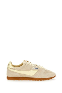 Autry women’s windspin low sneaker in grey cream suede and canvas with off-white swoosh and tan rubber sole