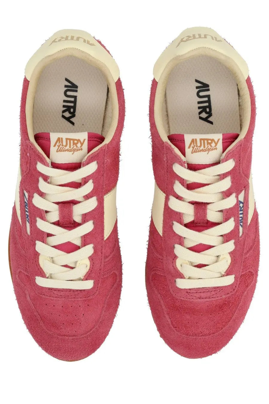 Autry women’s windspin low sneaker in pink suede with cream laces and retro design accents