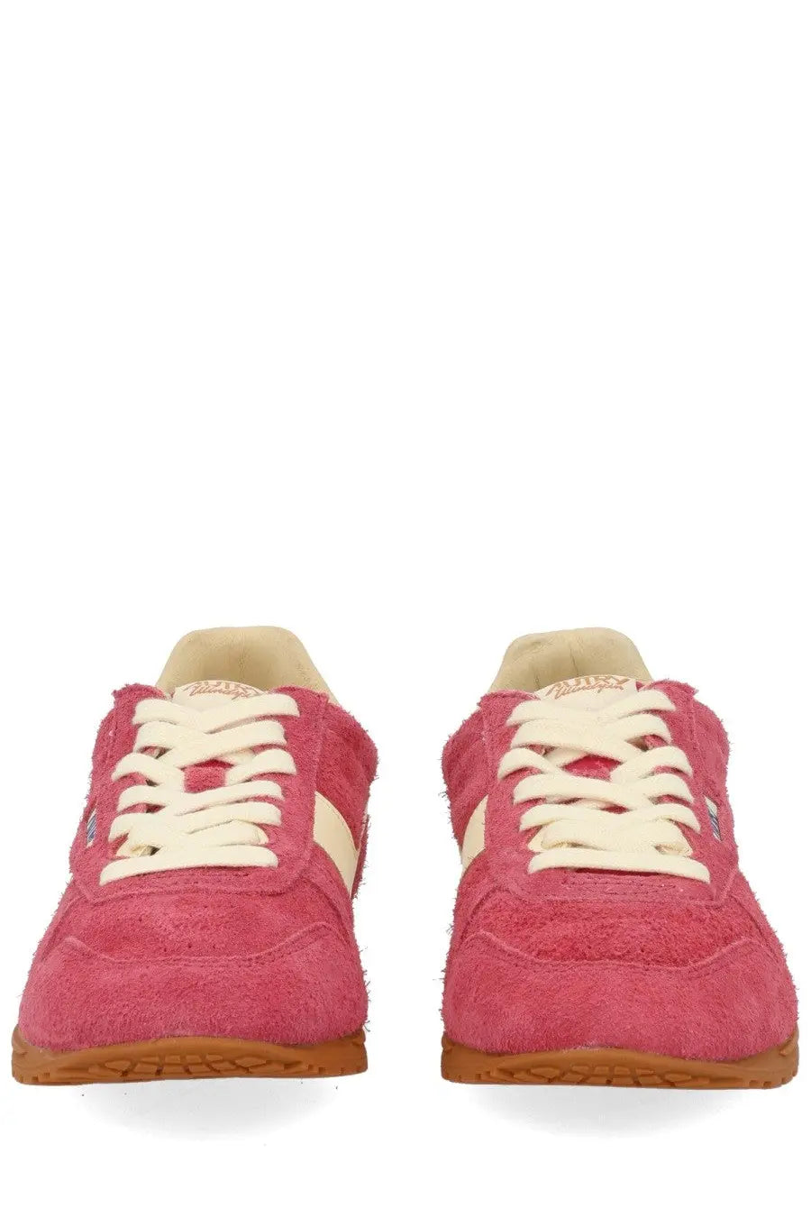 Autry women’s windspin low sneaker in pink suede with cream laces and tan rubber sole