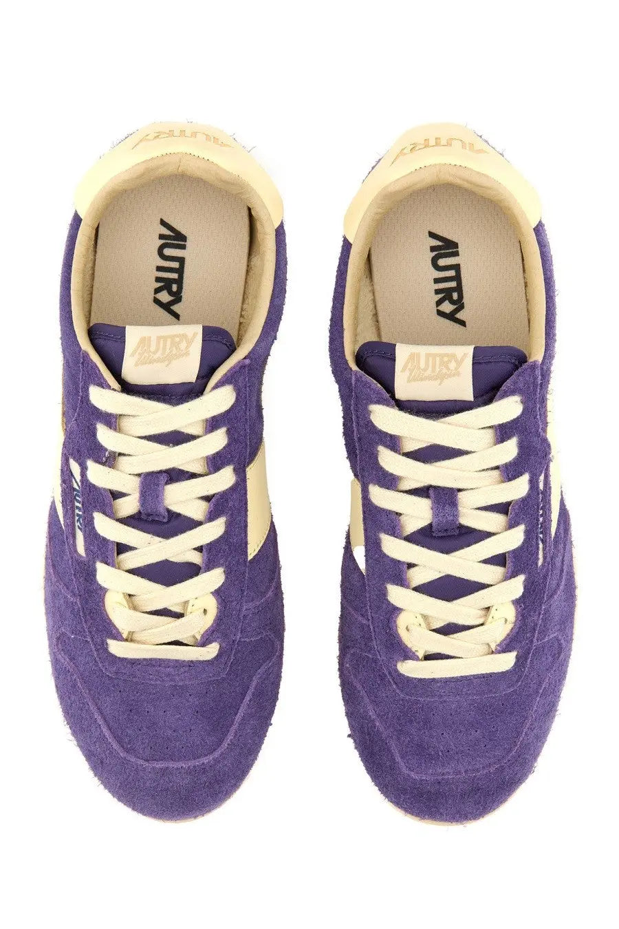 Autry women’s windspin low sneaker purple with purple suede, cream-colored laces, and cream accents