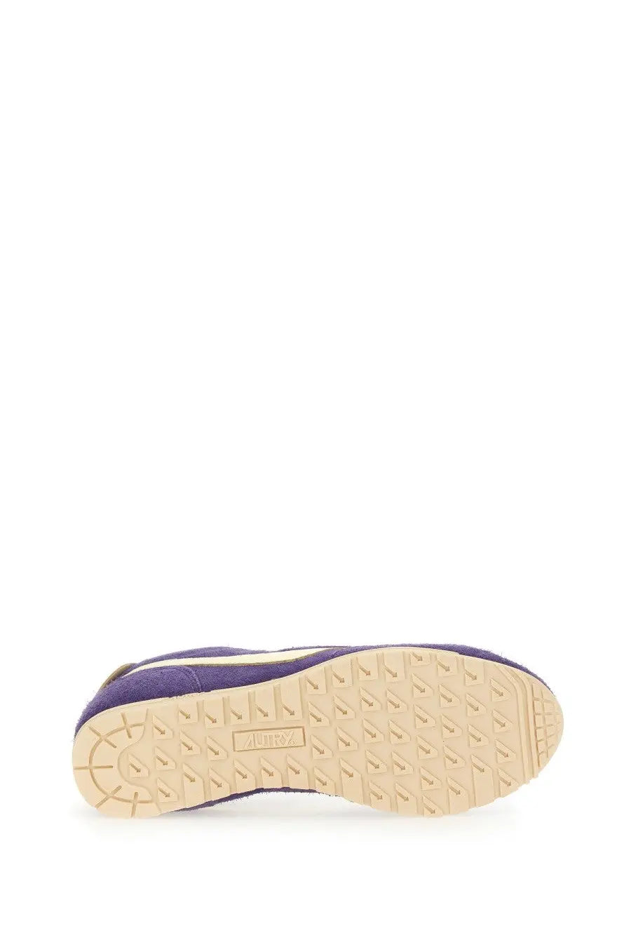 Back view of autry women’s windspin low sneaker in purple suede with beige rubber sole and subtle heel branding
