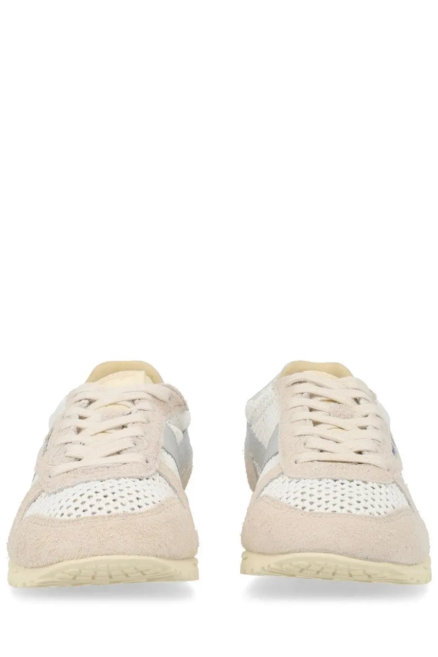Autry women’s Windspin sneaker in beige and white perforated suede with subtle gray side accent