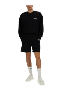 Awake ny men’s black oversized sweatshirt with white awareny logo on chest and left thigh in cotton blend