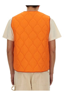 Bright orange quilted vest with diamond-shaped stitching pattern from awake ny mens vests collection