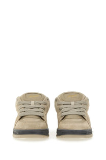 Axel Arigato men’s area haze sneaker beige low-top suede with black rubber soles and gold branding on the tongue