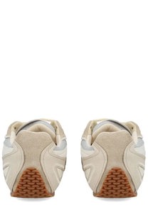 Axel Arigato men’s slow runner sneaker white in beige and light gray suede with textured brown rubber sole
