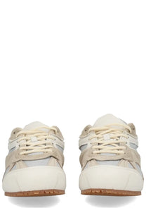 Axel arigato men’s slow runner sneaker white featuring beige and white suede and mesh with chunky sole