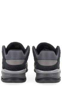 Axel Arigato men’s sneaker area black black and gray suede and canvas sneakers with chunky rubber sole front view