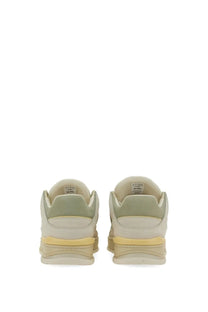 Axel Arigato men’s sneaker area green with off-white and pale green low-top design and yellow midsole