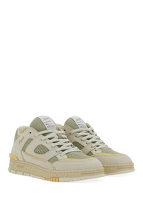 Axel Arigato men’s sneaker area green in beige and olive with perforated detailing and gold tone accents