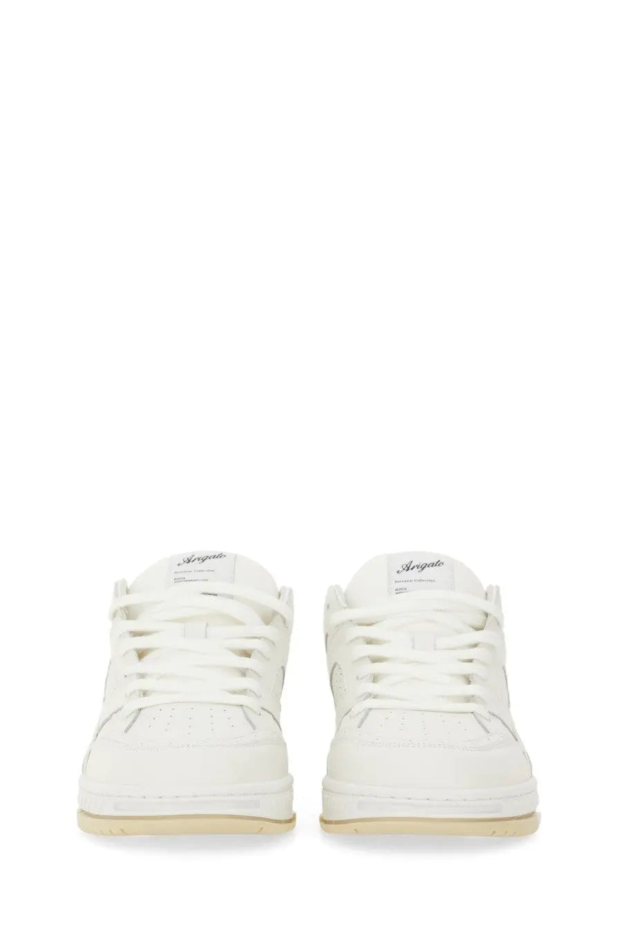 Axel Arigato men’s low-top sneakers in white with an argyle pattern and subtle beige soles featuring a minimalist design