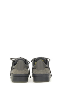 Axel Arigato men’s clay grey sneaker in dark gray suede and leather with a chunky rubber sole low top design