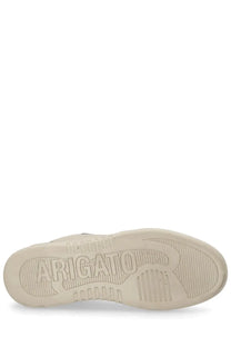 Cream-colored rubber sole with embossed arigato branding and textured grip on axel arigato men’s sneaker dice grey