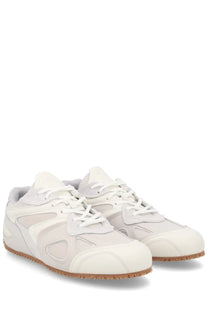 Axel Arigato men’s sneaker slow runner white cream-colored with modern minimalist layered panels and white laces