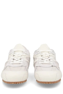 Axel Arigato men’s sneaker slow runner white cream suede rubber with white laces and tan soles minimalist design