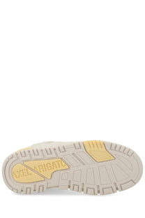 Cream-colored rubber sole with yellow accent and axel arigato branding on axel arigato men’s sneaker area lo label white