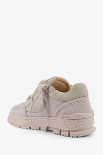 Axel Arigato women’s area loop beige suede low top sneaker with chunky rubber sole and subtle stitching details