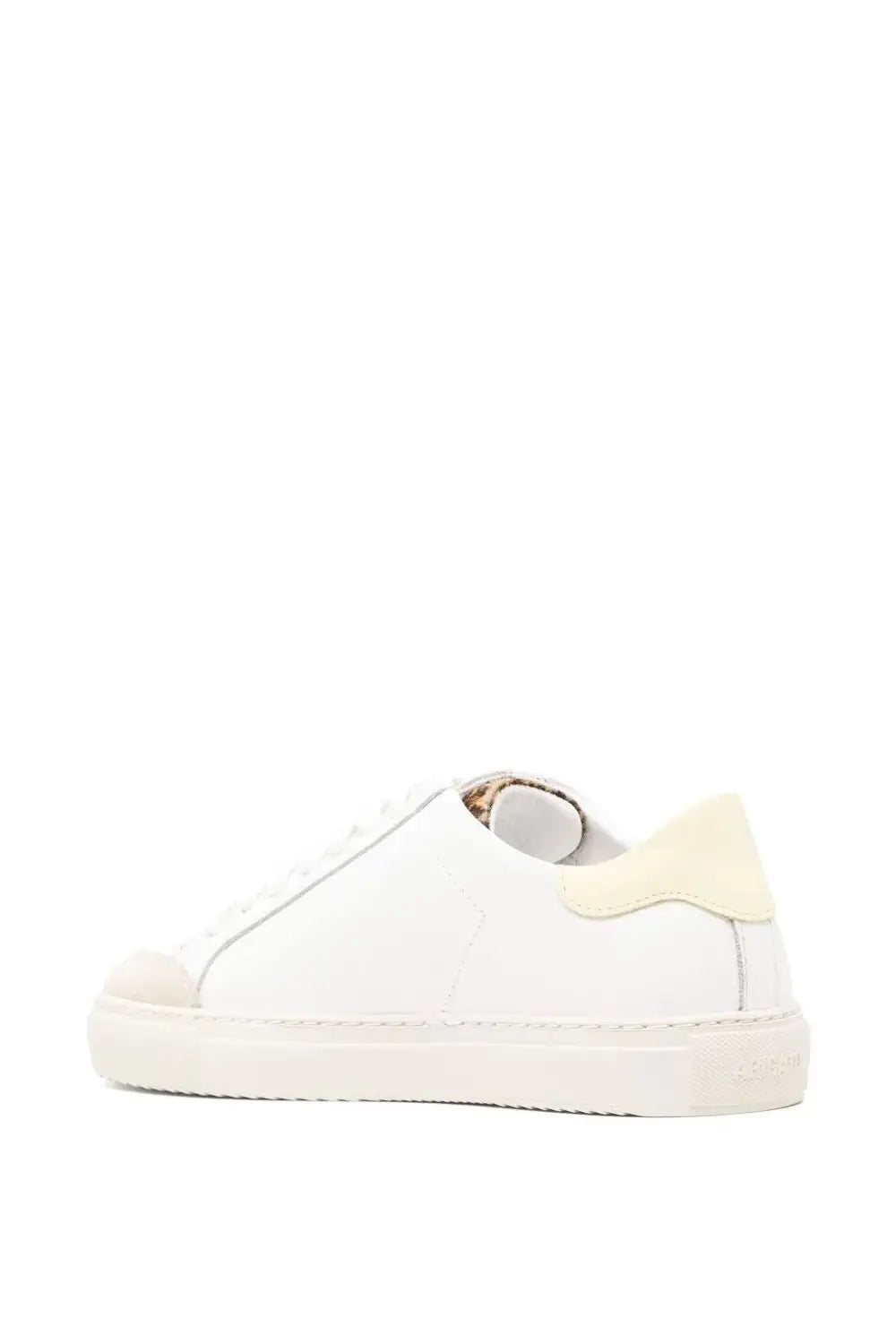 Axel Arigato women’s clean leather sneaker in white with pale yellow heel tab and toe cap featuring subtle stitching