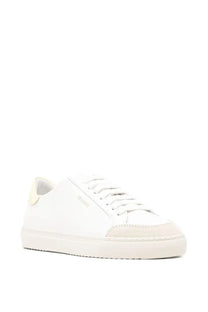 Axel Arigato women’s clean leather sneakers in white with subtle beige accents and minimalist design