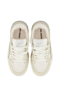 Axel arigato women’s sneaker lo area white cream-colored with chunky sole and perforated toe box