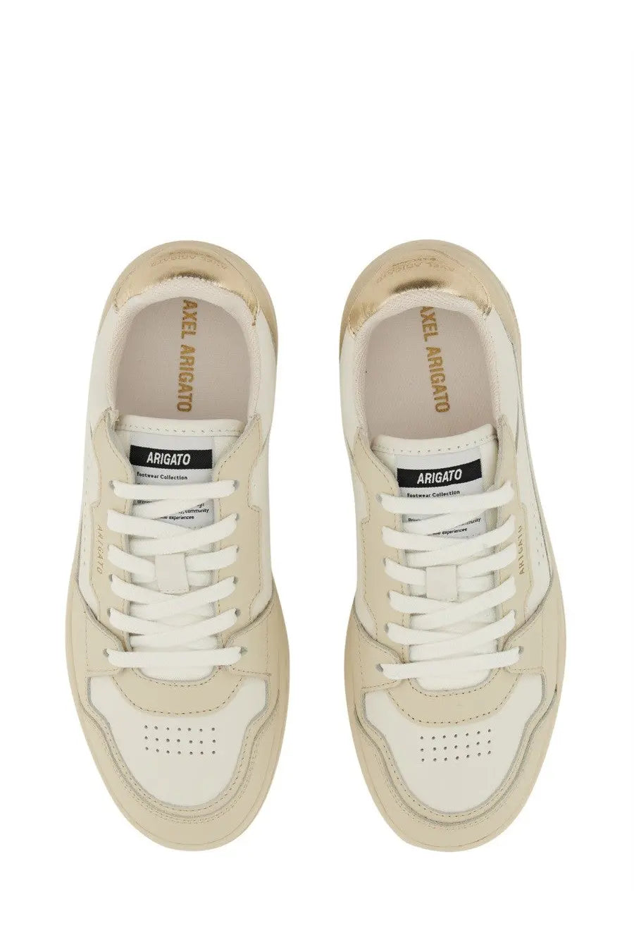 Axel Arigato women’s cream leather sneakers with white laces and gold metallic heel with arigato label inside