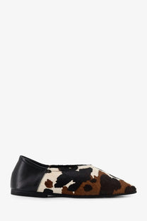 Babú milano women’s ponyskin ballerinas featuring a sleek black and brown cowhide print flat shoe design