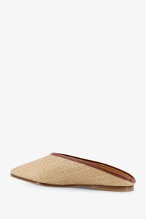 Beige woven straw mule slip-on shoe with brown leather trim and sole from Babú Milano women’s raffia sandals collection
