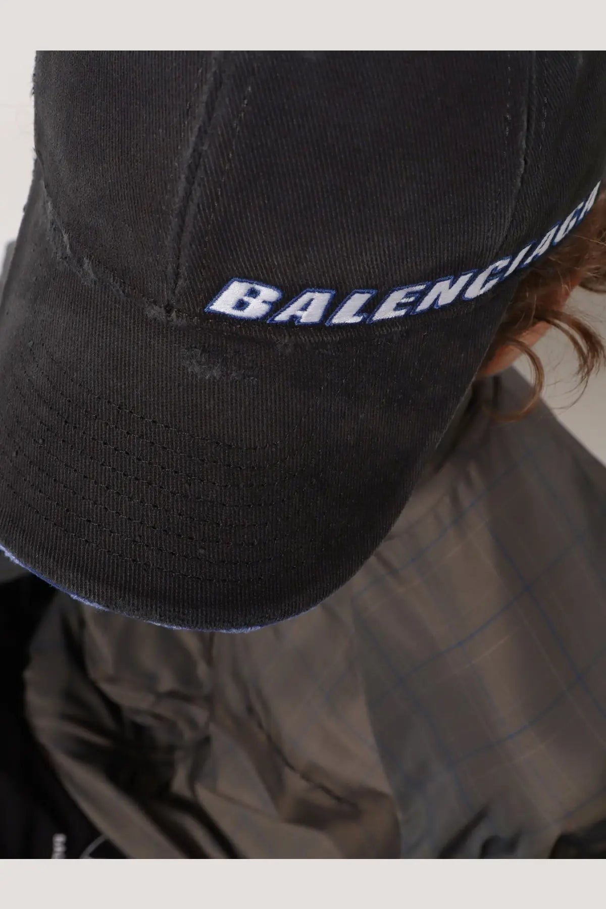 Balenciaga men’s black cotton baseball hat with white and blue embroidered logo front view