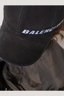 Balenciaga men’s black cotton baseball hat with white and blue embroidered logo front view
